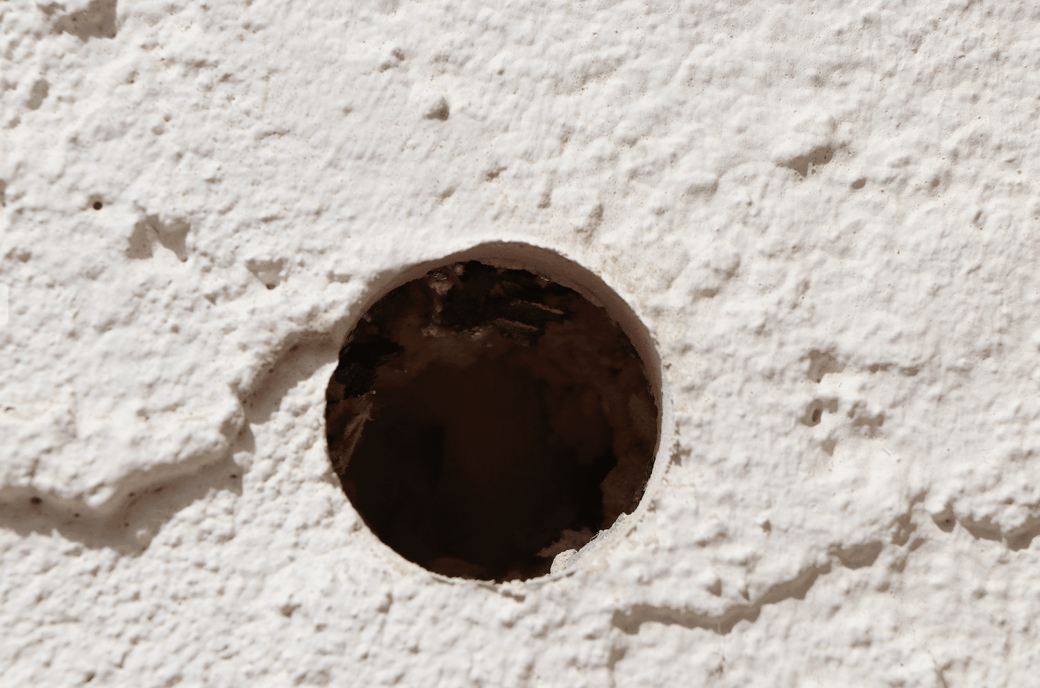 Core Sample During Stucco Inspection